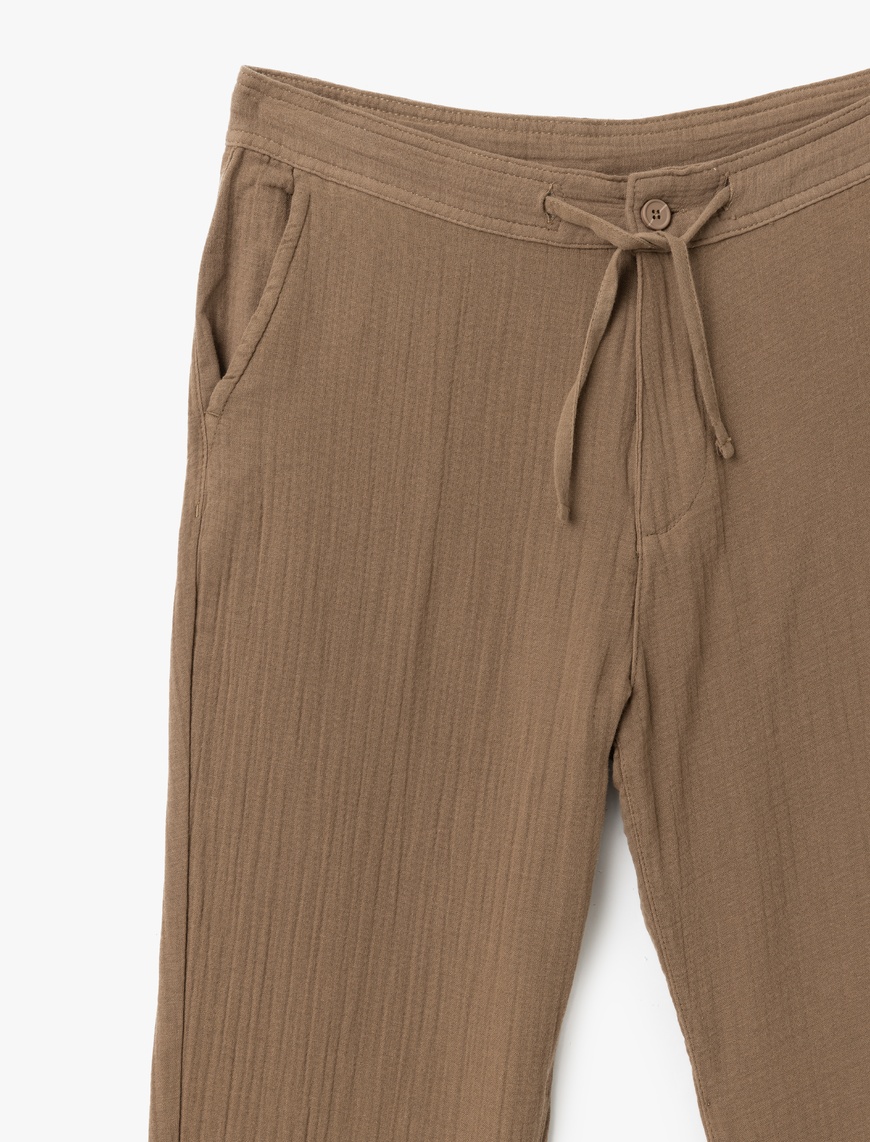   Pantalone sa vezivanjem
